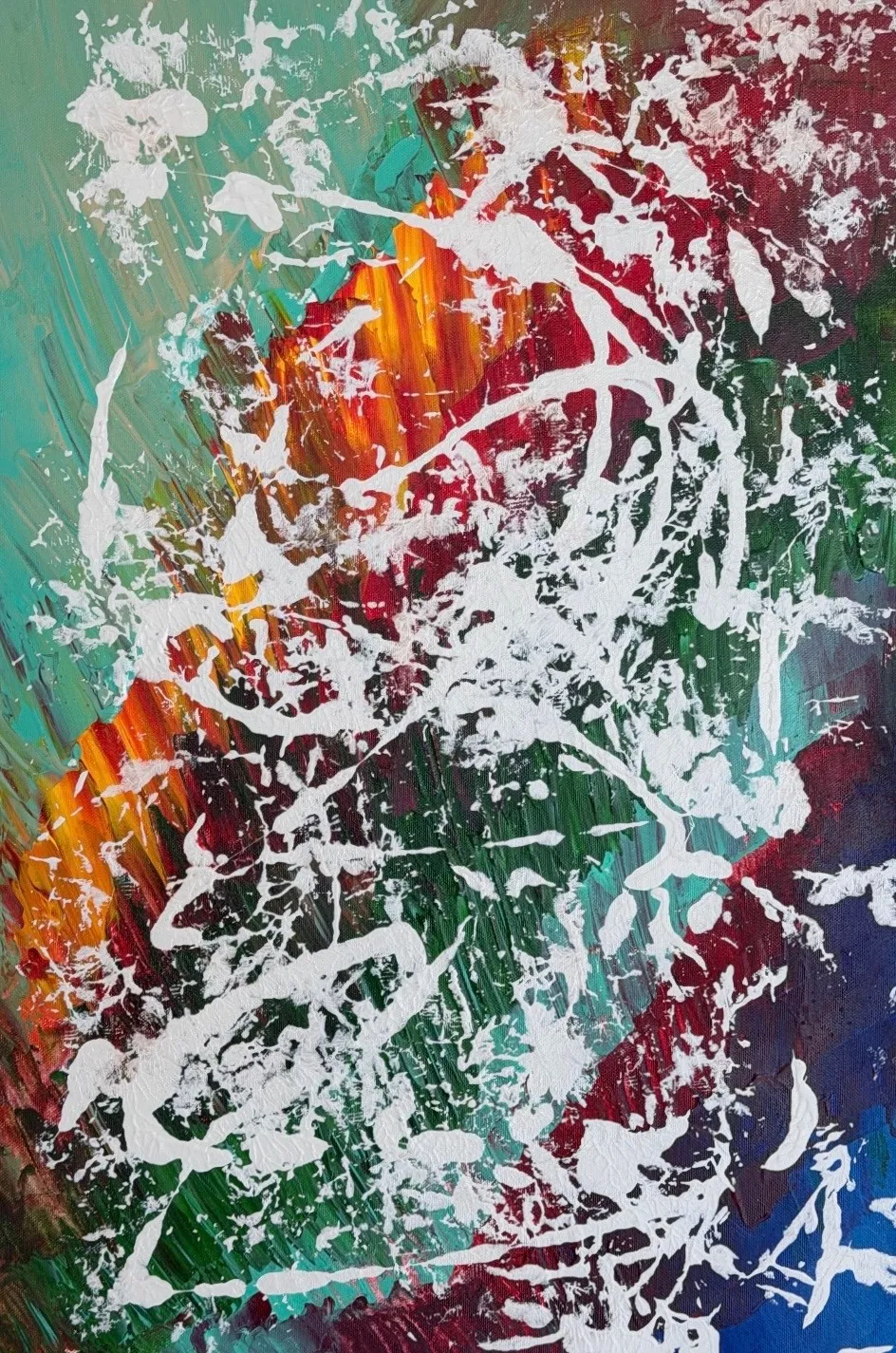 White lace-like strokes over a field of green, red, orange and blue.