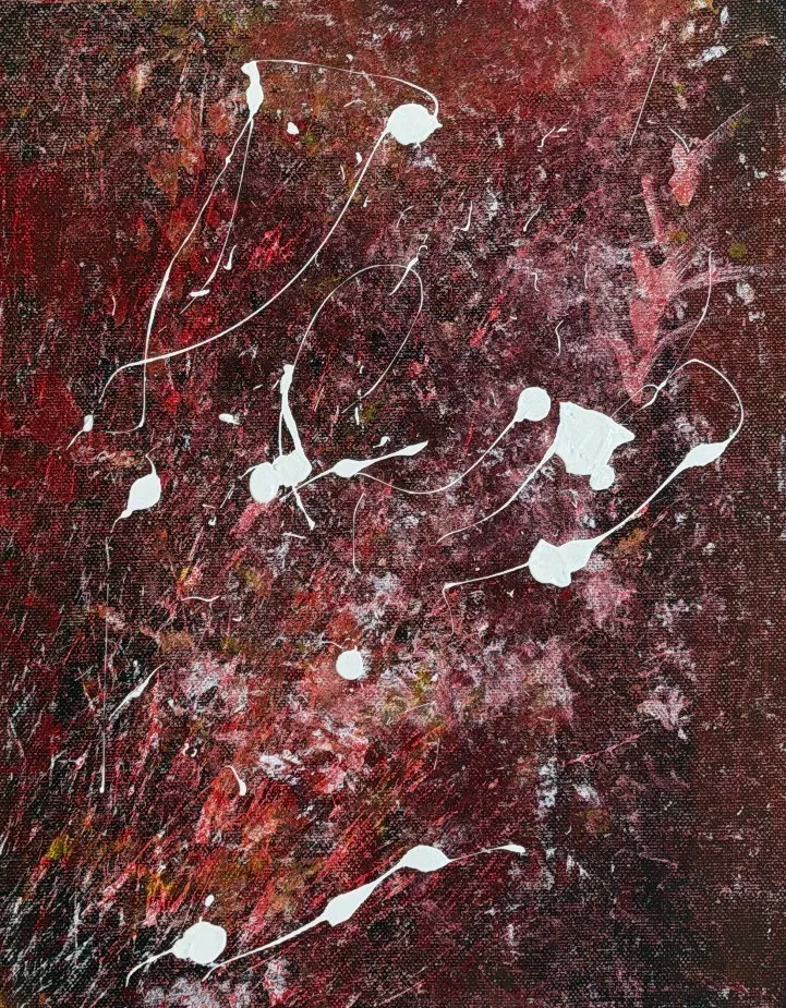 Dark red-brown ground with white drips, loops and flecks.